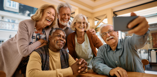 Life Assure Senior Friends Taking Selfie